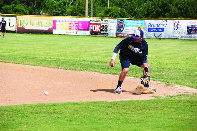 Senior first baseman G.R. Hinsley catches a ground ball during a Brazos Valley Bombers batting practice.
Photo by Cody Franklin.