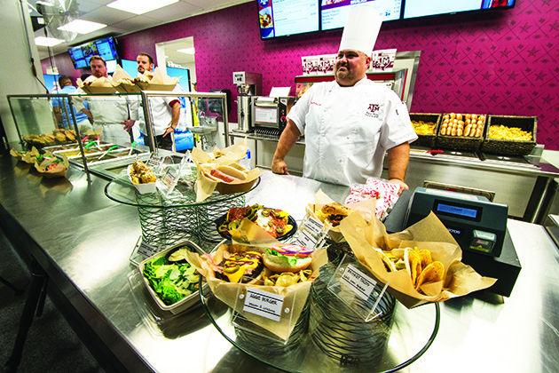 Tanner Garza — THE BATTALION
Levy Restaurant Executive Chef David Picou shows off the new menu selections offered at the concession stands inside Kyle Field.