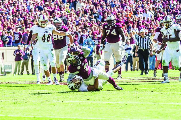 Bryan Johnson — THE BATTALION
Freshman Speedy Noil, who leads A&M in all-purpose yardage, is tackled Saturday against Louisiana-Monroe.