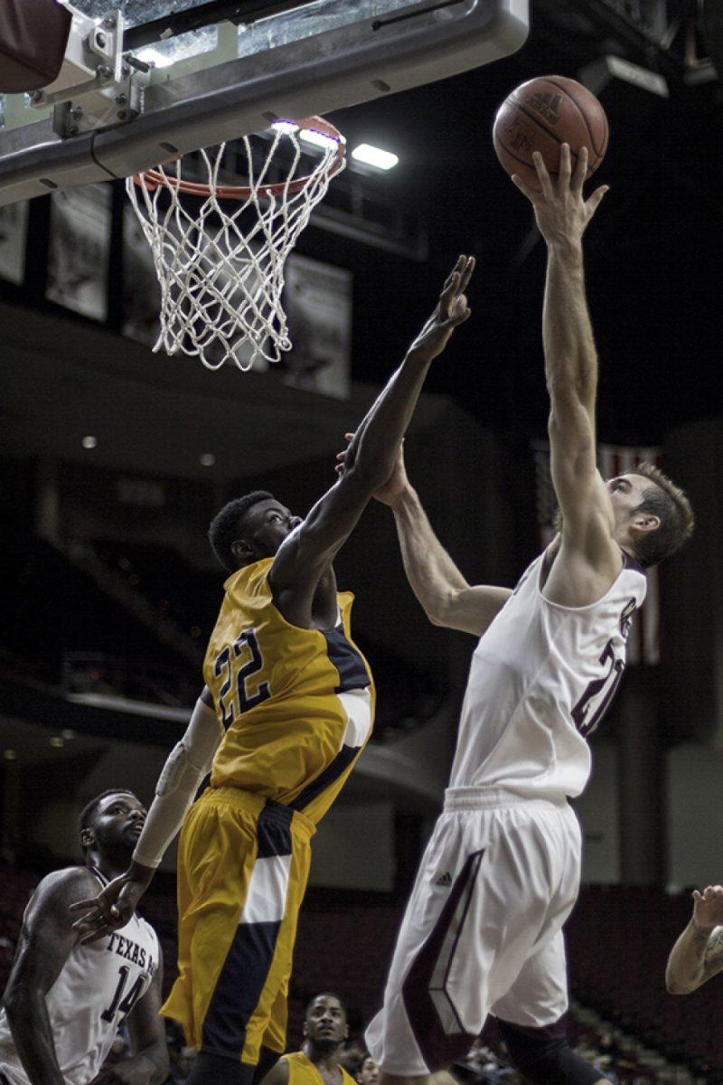Cody Franklin — THE BATTALIONGuard Alex Caruso goes for a layup in an exhibition match against Texas A&M Commerce.  The Aggies play the Northwestern State Demons in Reed Arena at 7 p.m. Friday.  