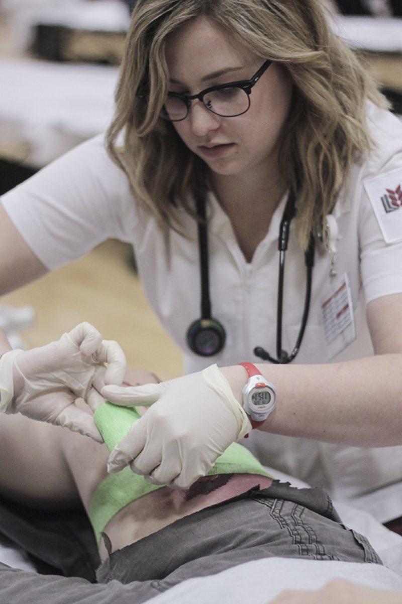 <p>FILE</p><p>A nurse attends to a “patient” during last year’s Disaster Day simulation.</p>