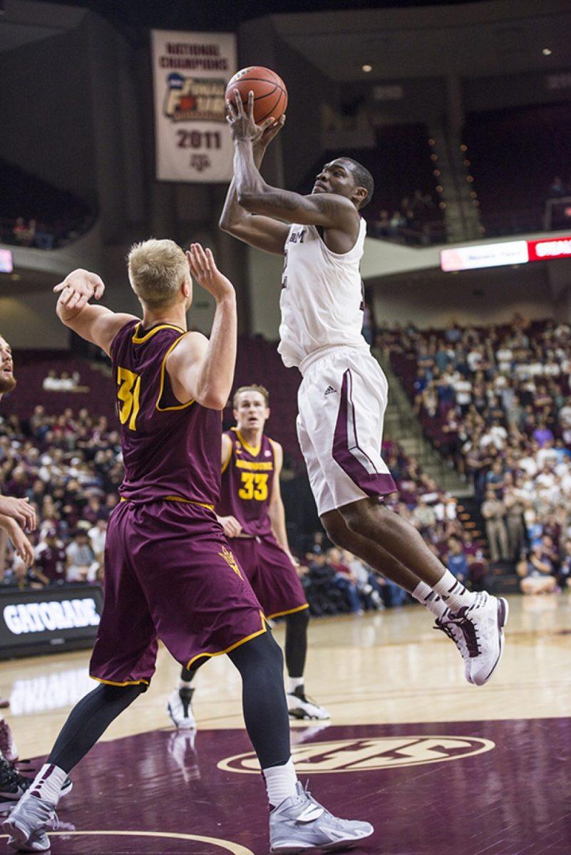 <p>Tanner Garza — THE BATTALION</p><p>Forward Jalen Jones makes a move to the basket at the A&M home game against Arizona State on Saturday.</p>