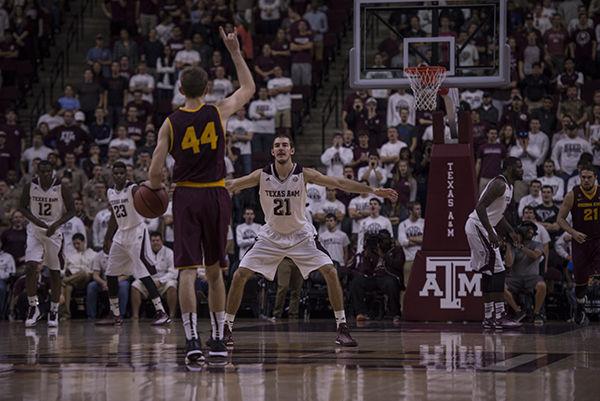 Junior guard Alex Caruso defends the top of the key during the A&M win Saturday.
Photo by Tanner Garza — The Battalion