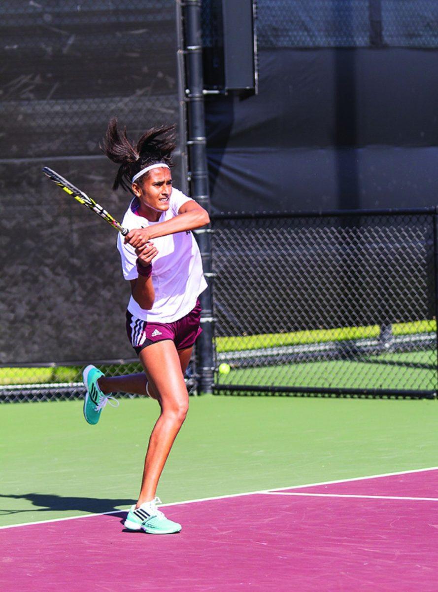 <p>Cody Franklin — THE BATTALION</p><p>Rutuja Bhosale, featured above, and her doubles partner Saska Gavilovska clinched the first point for the Aggies.</p>