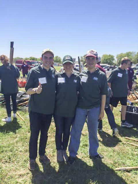 Big Event staff assistants Mark Dore, Brittany Phelps and Emre Yurttas.