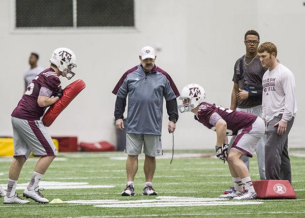Tim Lai — THE BATTALION
Defensive coordinator John Chavis leads a drill during spring practice.