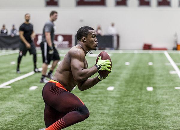 Shelby Knowles — THE BATTALION
Trey Williams completes drills at Pro Day Wednesday.