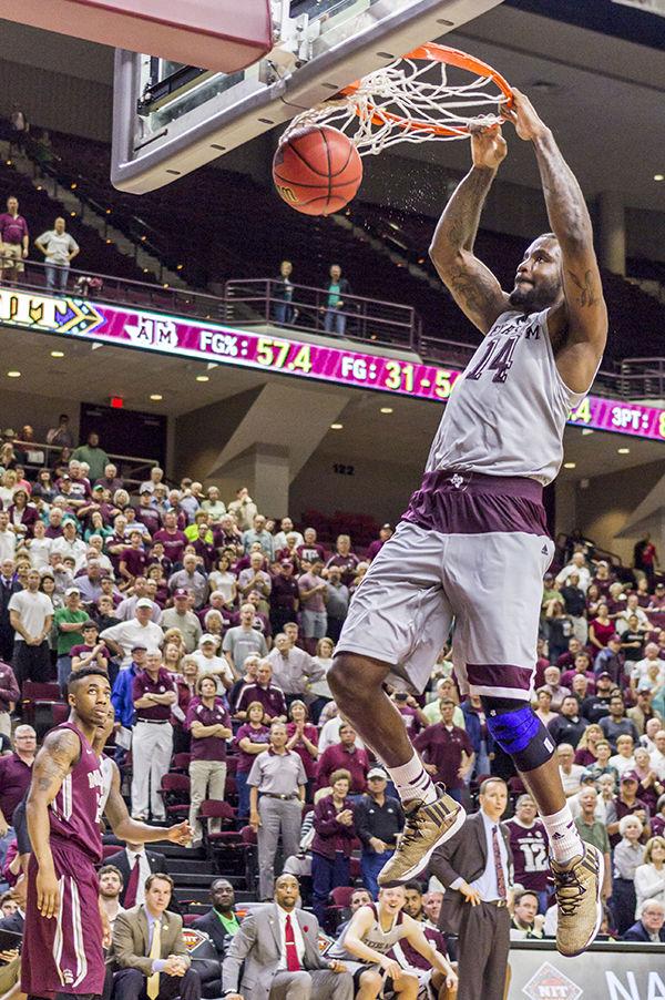 Senior forward Kourtney Roberson dunks during A&M’s 81-64 first-round NIT win over Montana.