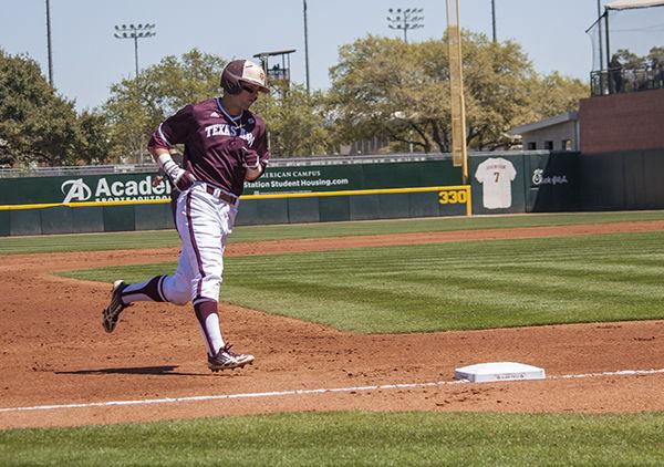 Sophomore Nick Banks runs third base after hitting a home run at Saturdays against Missouri.