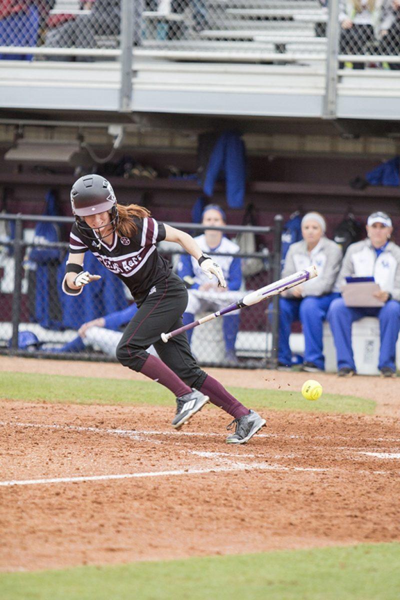 Cody Franklin — THE BATTALIONSenior outfielder Brittany Clopton lays down a bunt during the loss Sunday against Kentucky. 