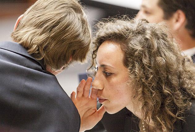 Vanessa Peña — THE BATTALION
Emma Douglas consults a member of her team.