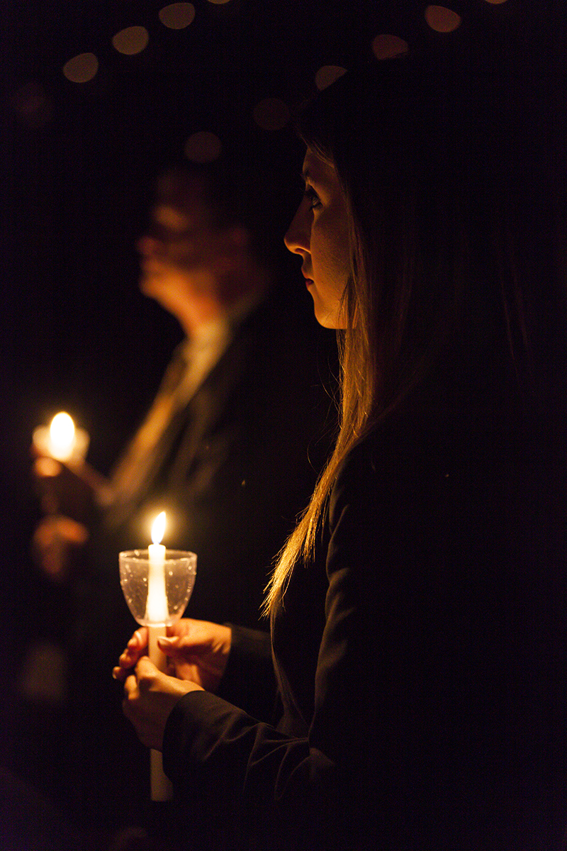 Family+and+friends+hold+a+candle+at+the+Muster+ceremony+on+Tuesday+for+the+aggies+they+lost.