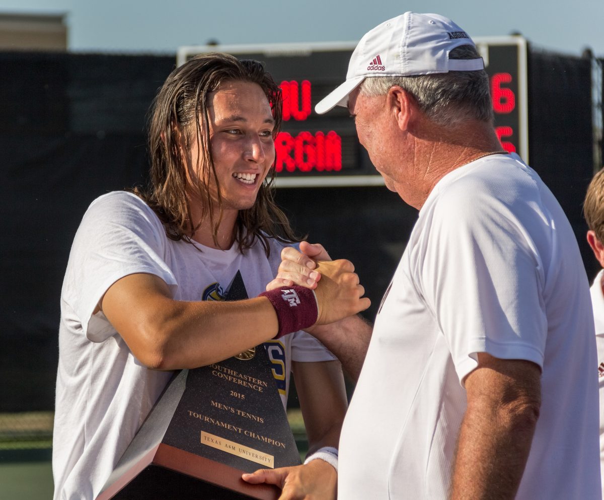 Jeremy Efferding&#160;celebrates after winning the deciding match in the men's tennis SEC Championship.