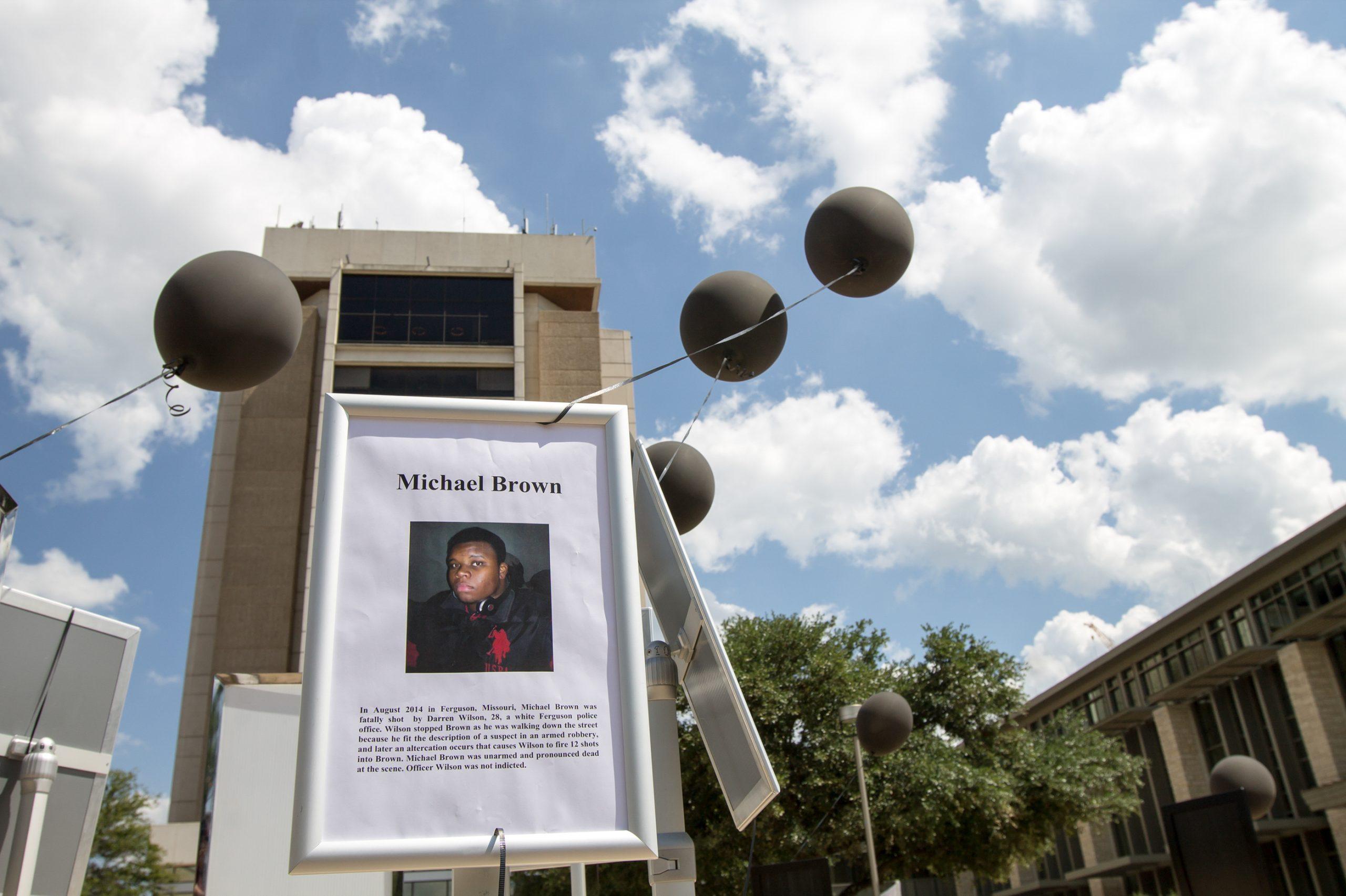 Black balloons meant to stir conversation on police violence