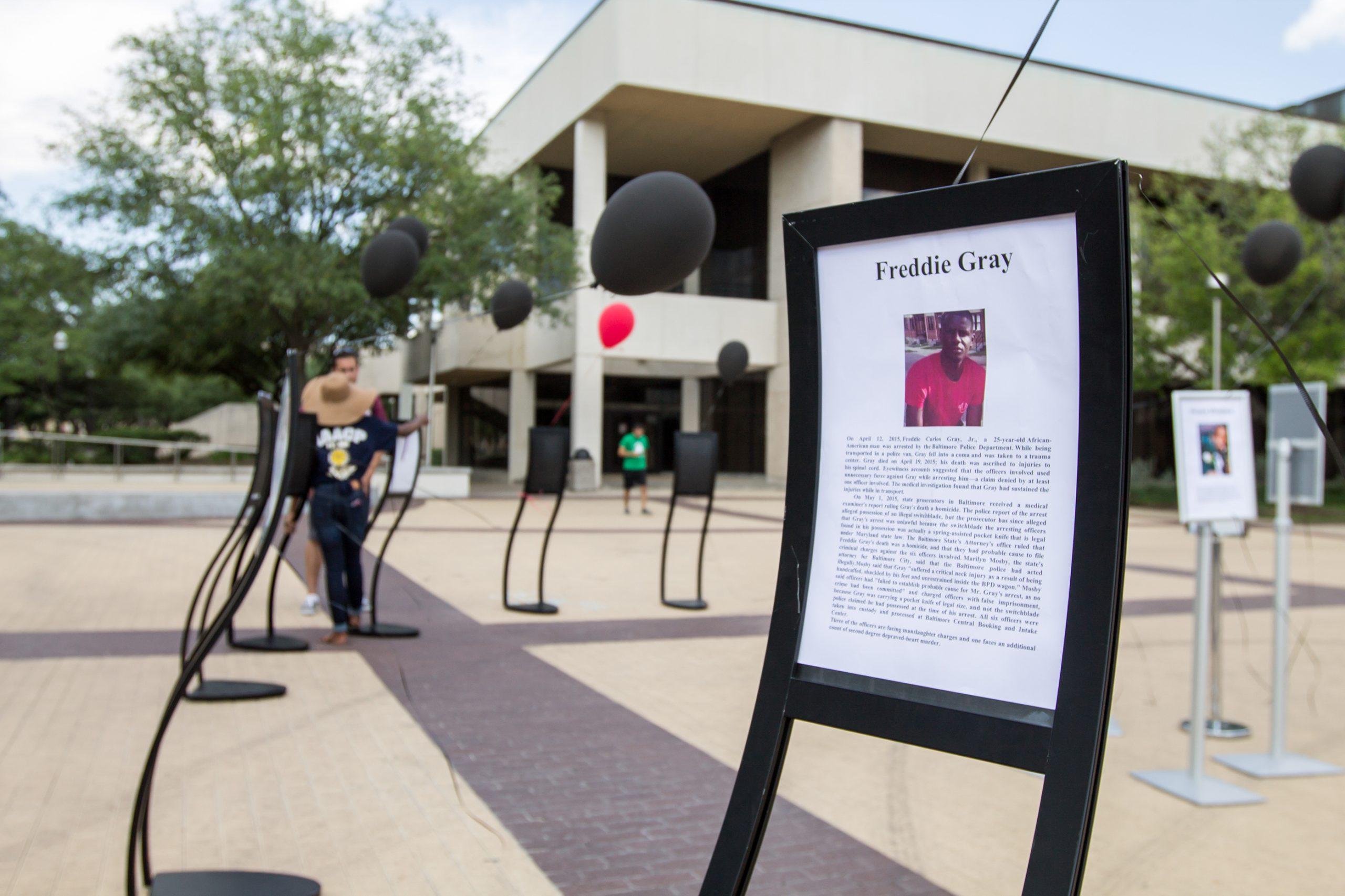 Black balloons meant to stir conversation on police violence