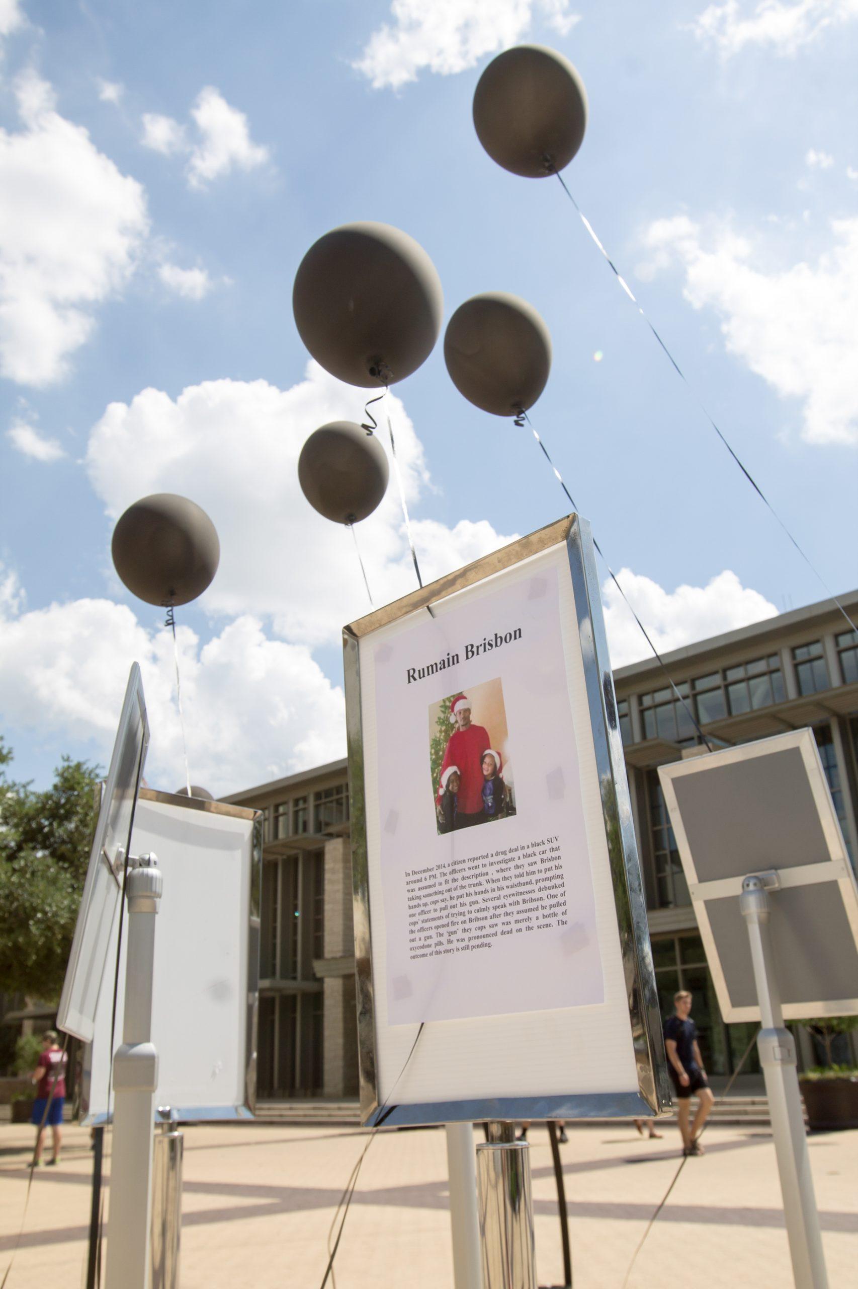 Black balloons meant to stir conversation on police violence