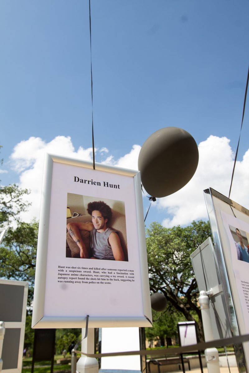 <p>The display features victims of police brutality, including Darrien Hunt.</p>