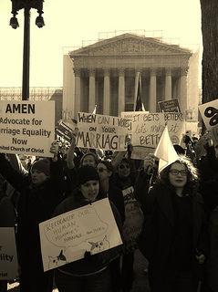 Demonstrators gather outside the Supreme Court building during gay marriage hearings.