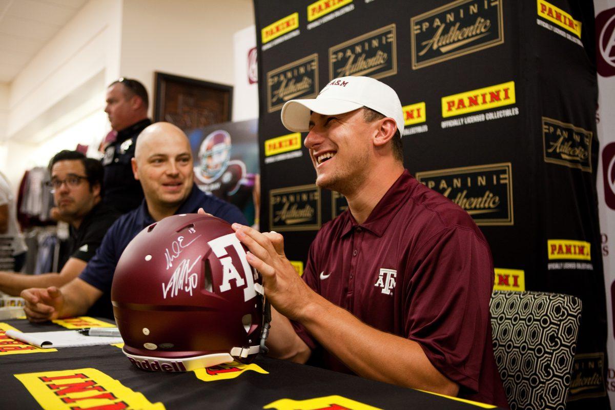 <p>Smiles like these from Manziel are few and far between these days.</p>