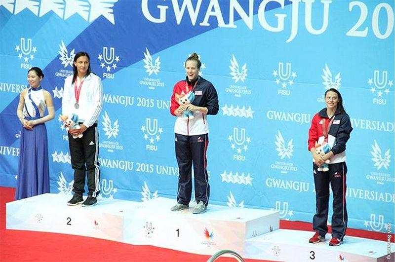 Senior Sarah Henry stands with her Gold medal at the University Games that were held this year in Gwangju, South Korea.