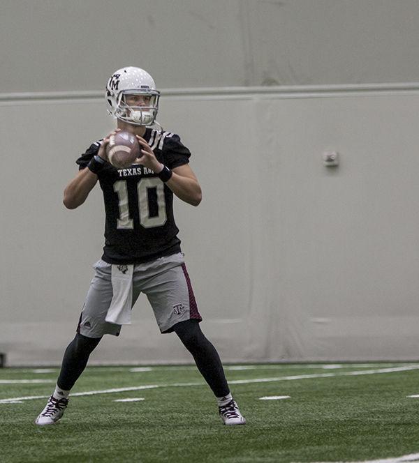 Jena Floyd — THE BATTALIONKyle Allen, who started five games last season, completes drills during day two of spring practice Tuesday. 