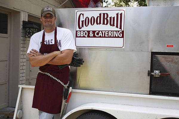 Roy May shows off the smoker he uses in his new catering company GoodBull BBQ. 