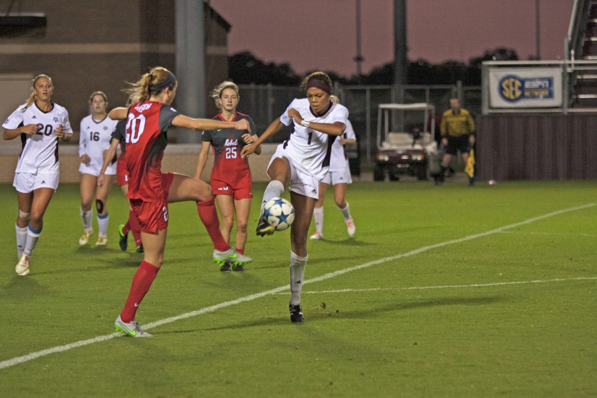 Ally watt kicks the ball before an Ole Miss player can.&#160;