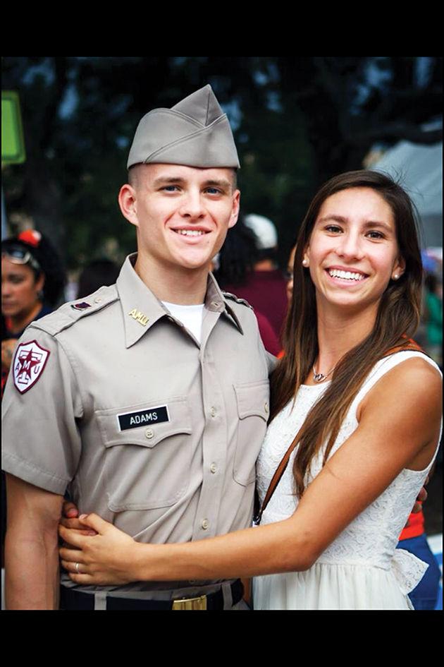 Dalton Adams stands with his girlfriend Lauren Fritz.