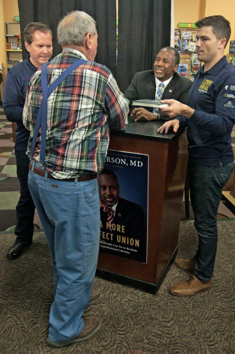 Ben Carson shook many hands and signed many books during his book tour stop in Bryan, TX. 