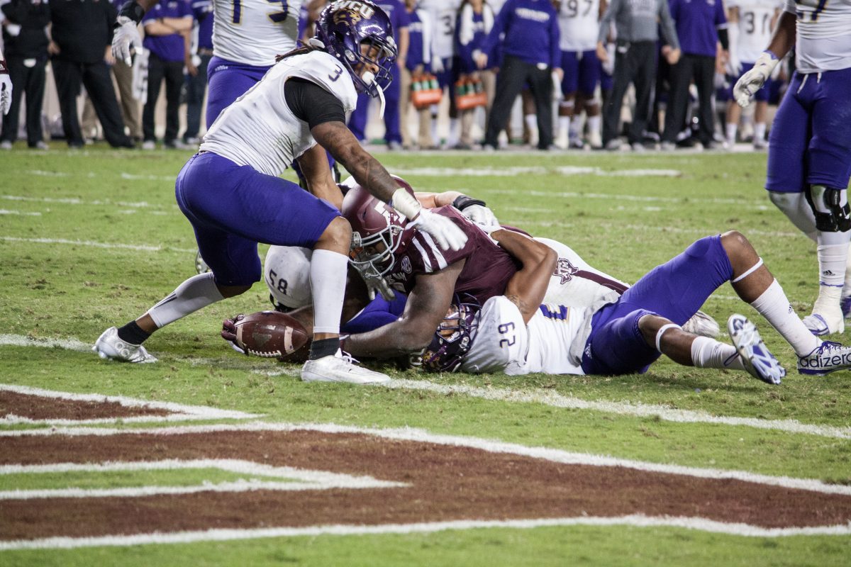 Tra Carson barely makes the touchdown.