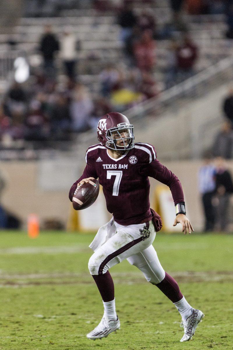 <p>Sophomore quarterback Jake Hubenak looks for an open receiver during Texas A&M's Saturday loss to Auburn.</p>