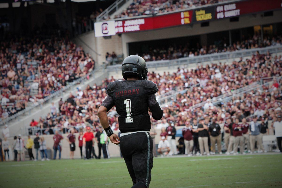 Kyler+Murray+walks+back+to+the+huddle+during+his+first+ever+start+as+an+Aggie.