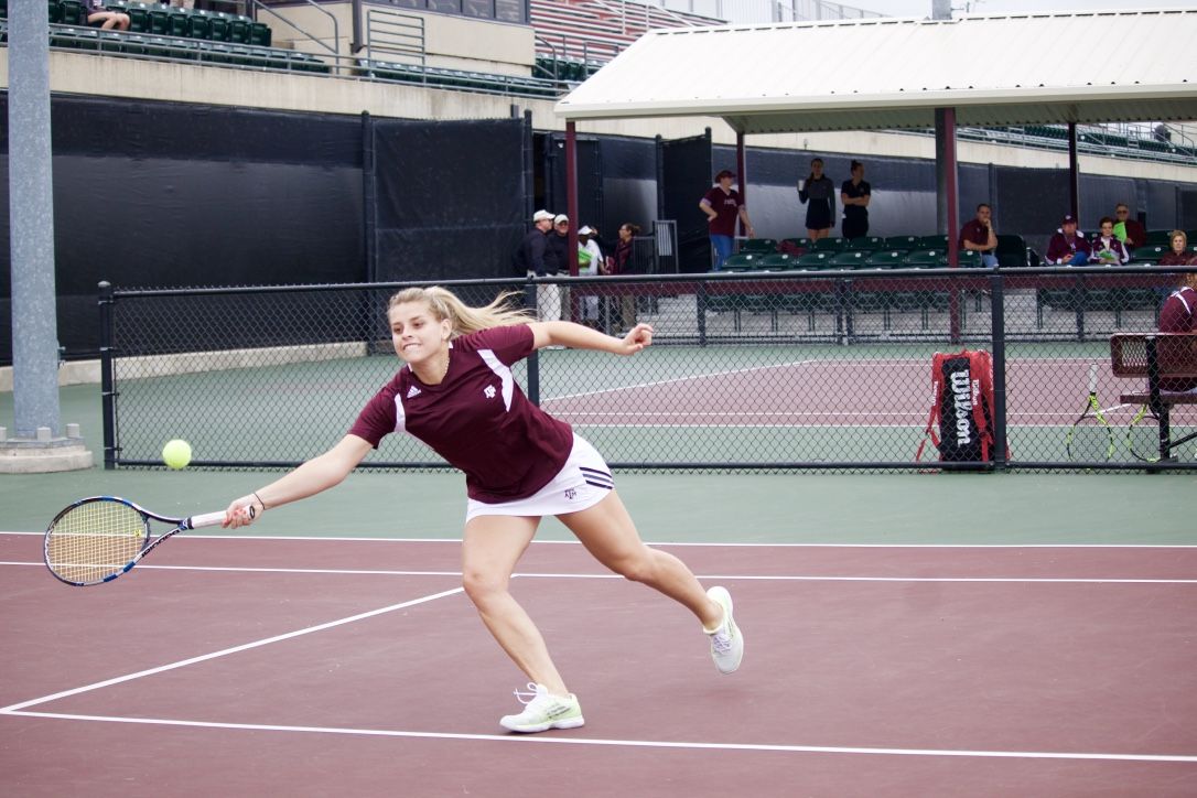 Senior Ines Deheza playing doubles against SFA with freshman Domenica Gonzalez.