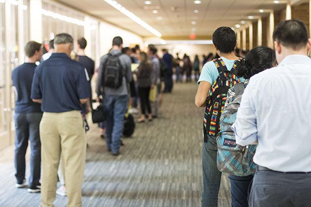 Students wait in line for as long as two hours to vote in the primaries at the MSC