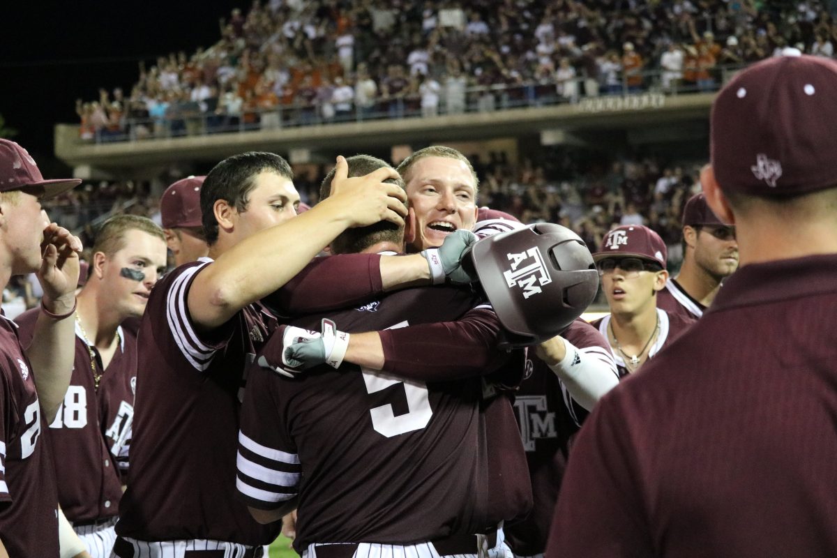 The+Texas+A%26amp%3BM+baseball+team+celebrates+a+victory+over+the+University+of+Texas+at+Olsen+Field.