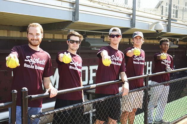 Ryan Sebesta, Tyler Volk, Cole Bishop, Andrew Bobo and Amado Martinez are five of the Sugar Daddies, a group that supports the A&M softball team at every home game.