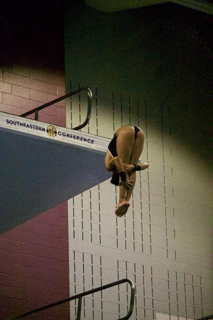 Freshman Alaïs Kalonji diving in the NCAA Zone D Championships, displaying excellent form in this pike position. 