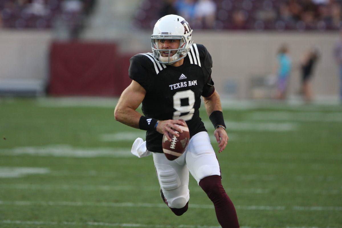 Senior Transfer Trevor Knight scrambles during the Spring Game. Knight found the endzone three total times.
