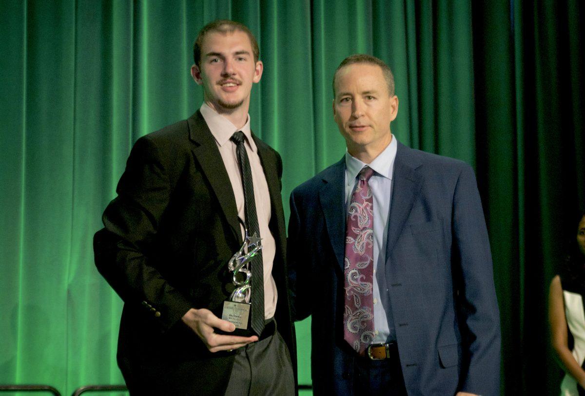 <p><strong>Alex Caruso</strong> accepted the Male Athlete of the Year award with his coach, <strong>Billy Kennedy</strong>.</p>