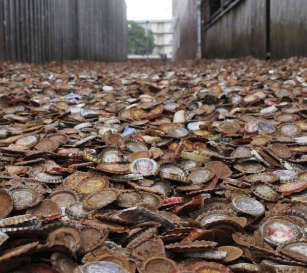 Tucked between the the Dixie Chicken and the Dry Bean, Bottle-cap Alley has collected years of bottle caps from patrons of the Northgate district.