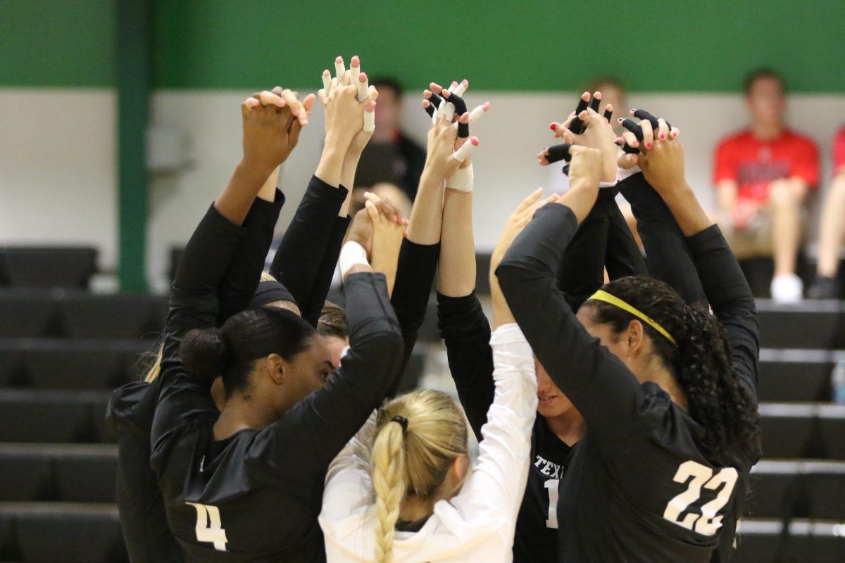 A&Ms volleyball team celebrates after the 3-0 won over Nevada.