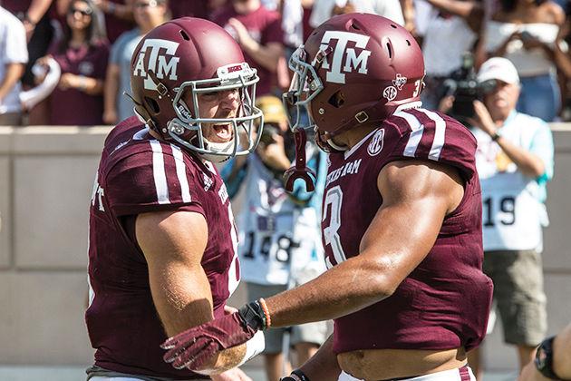 Trevor Knight and Christian Kirk celebrate after combining for a touchdown.
