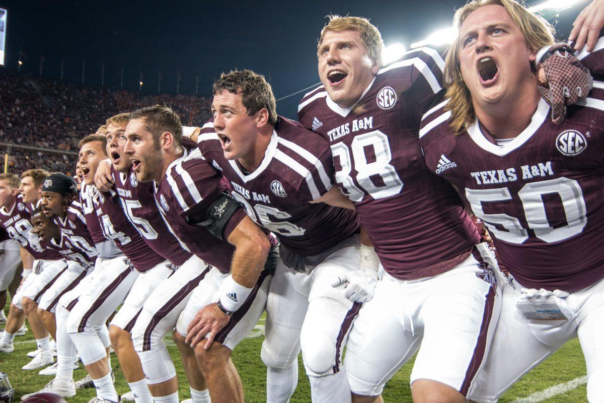 Texas A&M players celebrating their 38-45 victory over Tennessee.