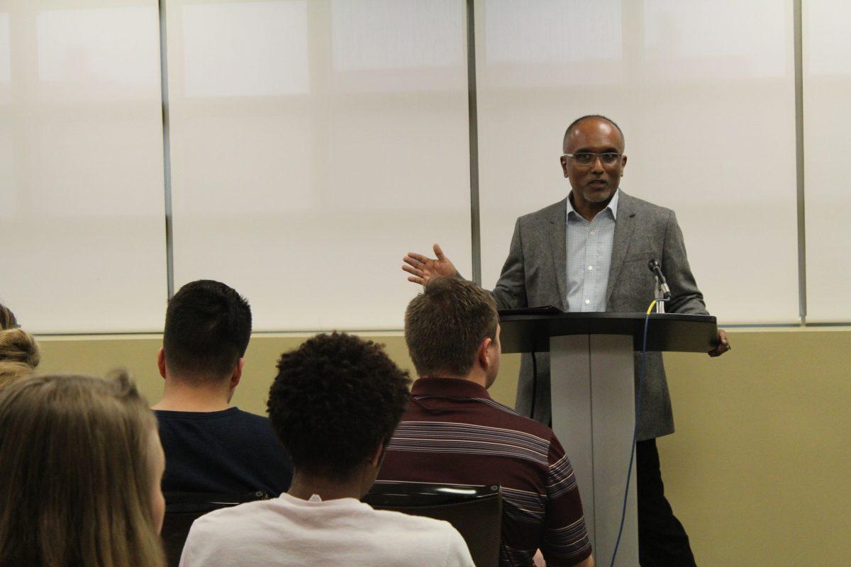 Dr. Cherian George speaking to an audience at his lecture titled On the Offensive: The Global Advance of Intolerance in Democratic Politics