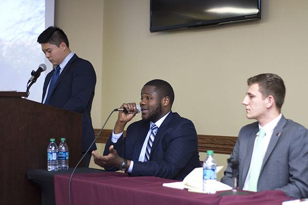 Junior supply chain management major Ben Ikwuagwu (middle), economics senior Bobby Brooks (right) and a representative filling in for Kilian Bresnahan answer questions based on recent diversity issues and topics happening on the Texas A&amp;M campus this past Monday in Rudder Tower.