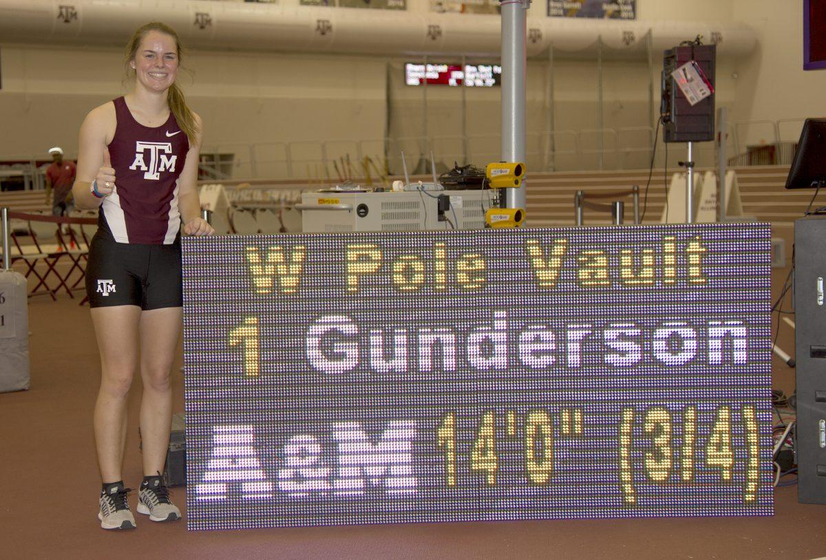 Emily Gunderson poses with her record height.