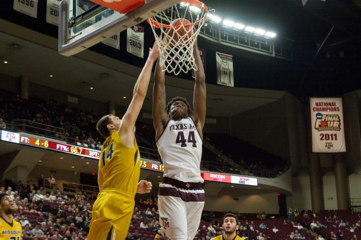 Freshman forward Robert Williams dunked the ball three times against the Tigers on Wednesday night.
