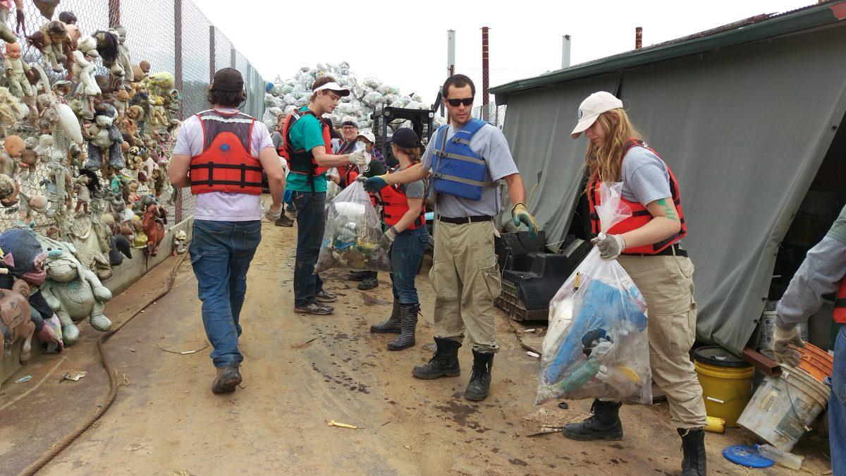 Annual Alternative Spring Break (ASB) program provides students with a chance to volunteer around the country. Pictured: ASB members clean up trash during 2015 trip.