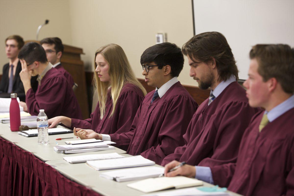 The SGA Judicial court mediates and presents questions to both the defense and the prosecution. 