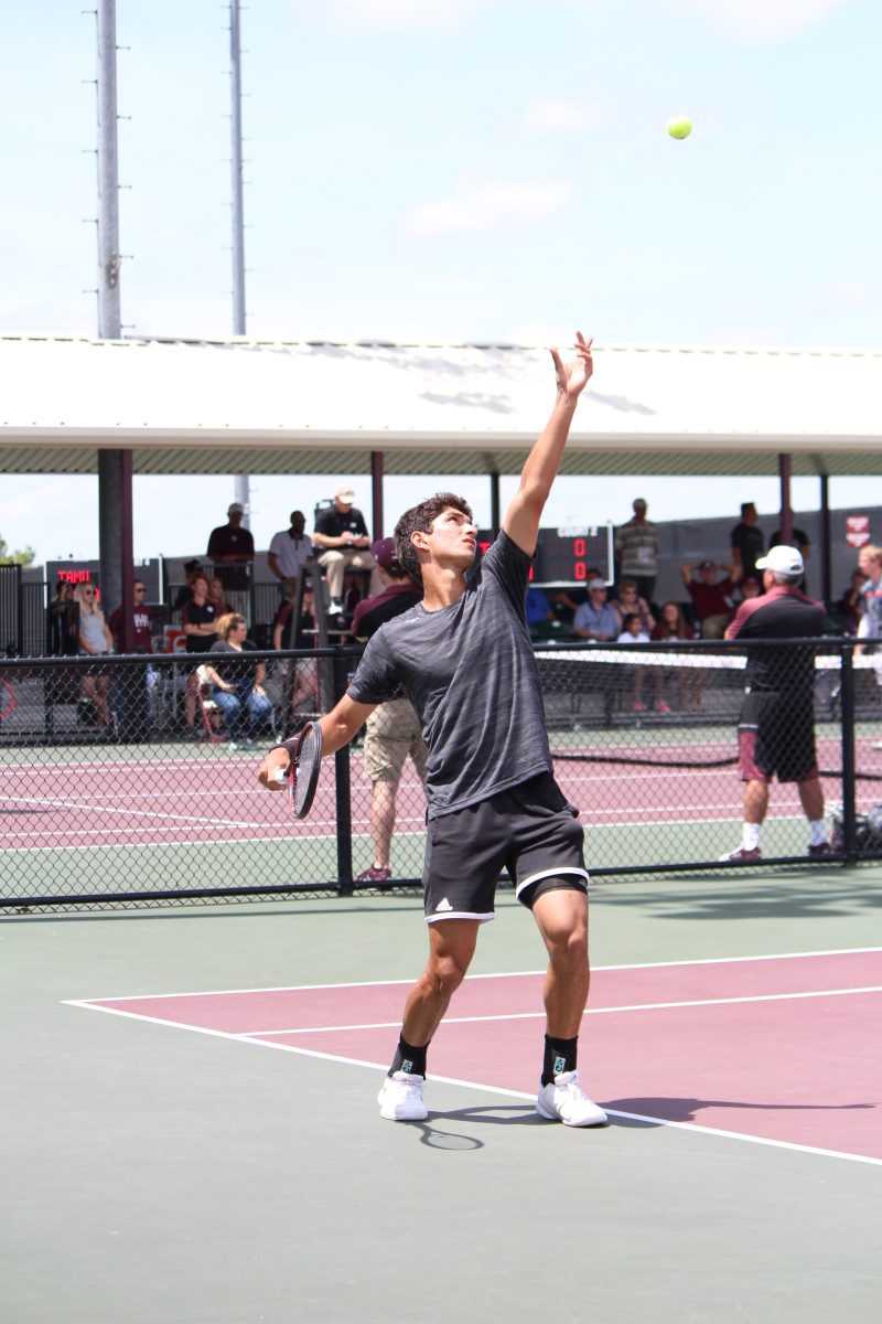 Freshman Hady Habib serves a ball to his opponent Georgia State.&#160;